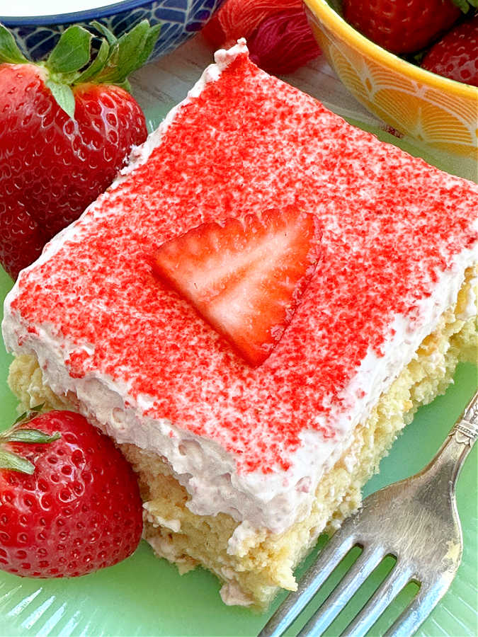 a plated slice of strawberry tres leches cake