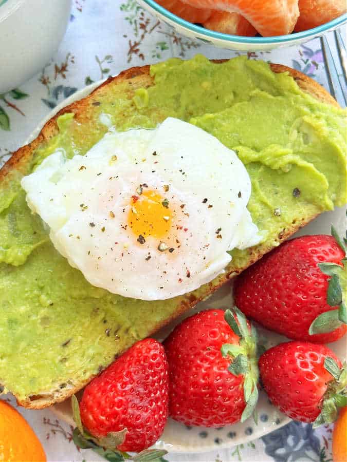 air fryer poached egg on top of a slice of avocado toast