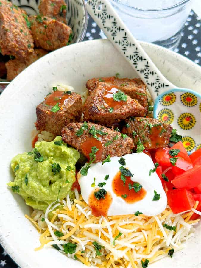 air fryer steak bites served in a burrito bowl