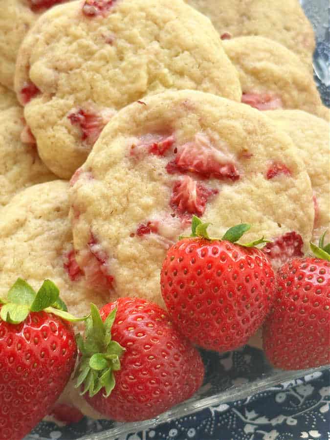 close up of a platter of freshly baked strawberry sugar cookies