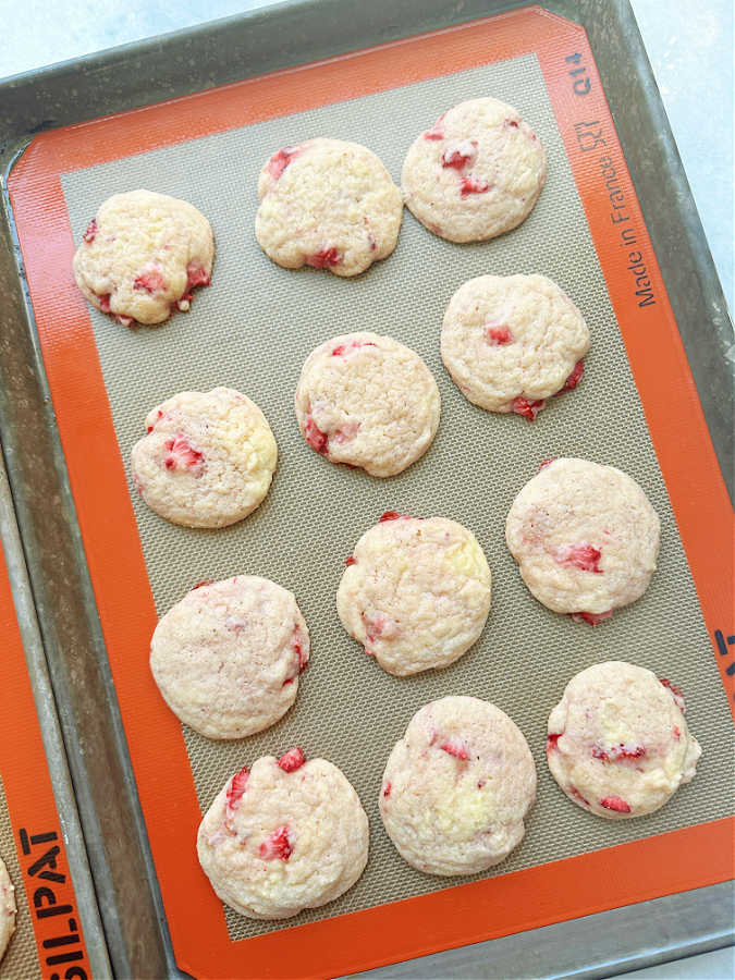 strawberry sugar cookies cooling on the baking sheet