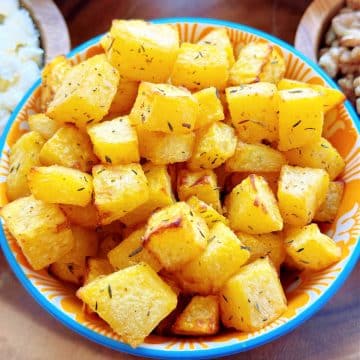 Your air fryer is the best way to make perfectly roasted pumpkin cubes from a fresh pumpkin for a healthy snack or adding to a beautiful fall salad.