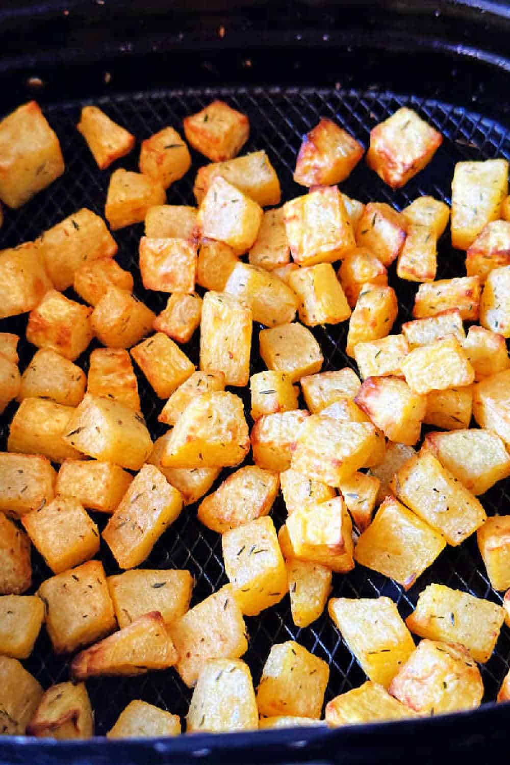 Your air fryer is the best way to make perfectly roasted pumpkin cubes from a fresh pumpkin for a healthy snack or adding to a beautiful fall salad. via @foodtasticmom