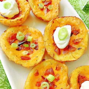 plated air fryer potato skins garnished with sour cream and green onions