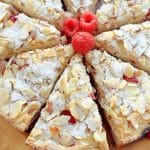 Raspberry Almond Cake is a perfect cake for entertaining. Mixed in one bowl and baked in a springform pan, packed with raspberries and almonds.