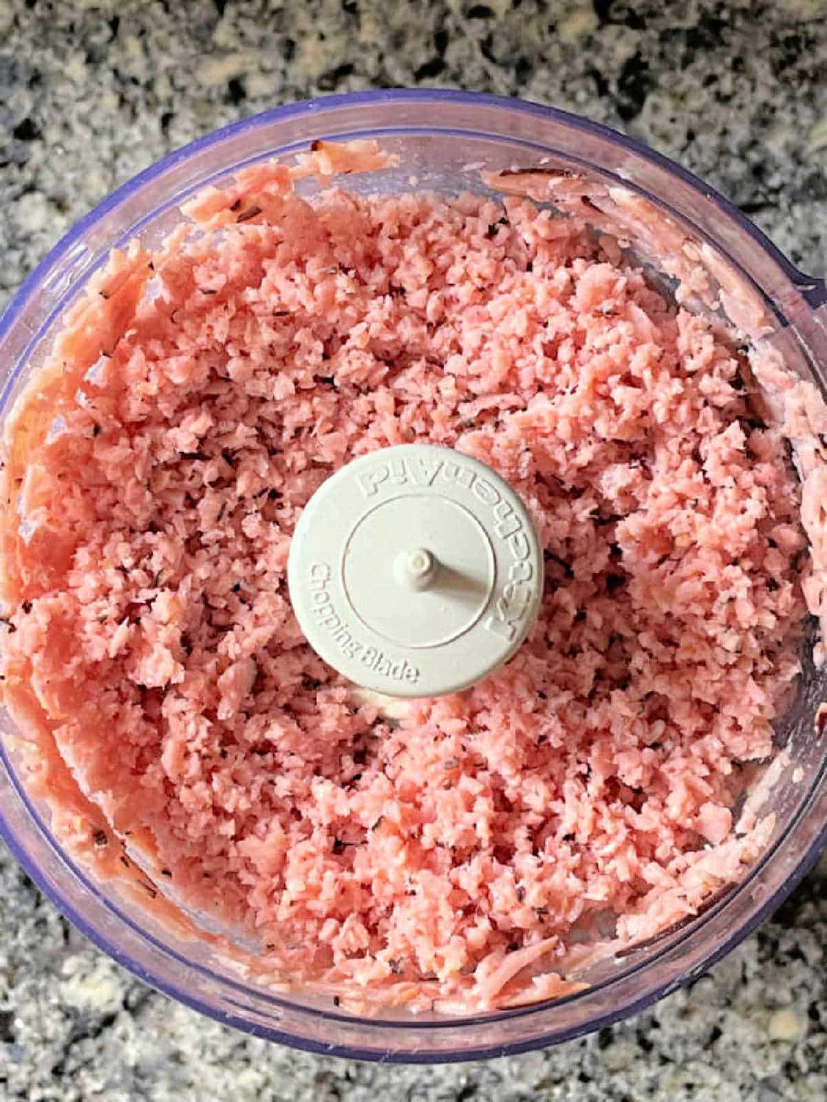 showing the ham being chopped in the food processor bowl