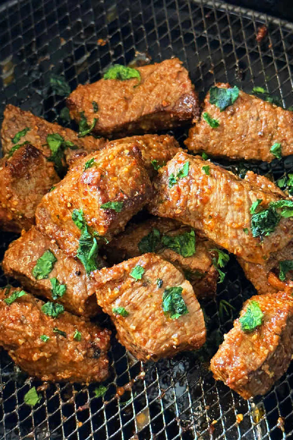 Air Fryer Steak Bites are an economical choice to make a pricier steak feed more people. They are so quick to make and perfectly cooked! via @foodtasticmom