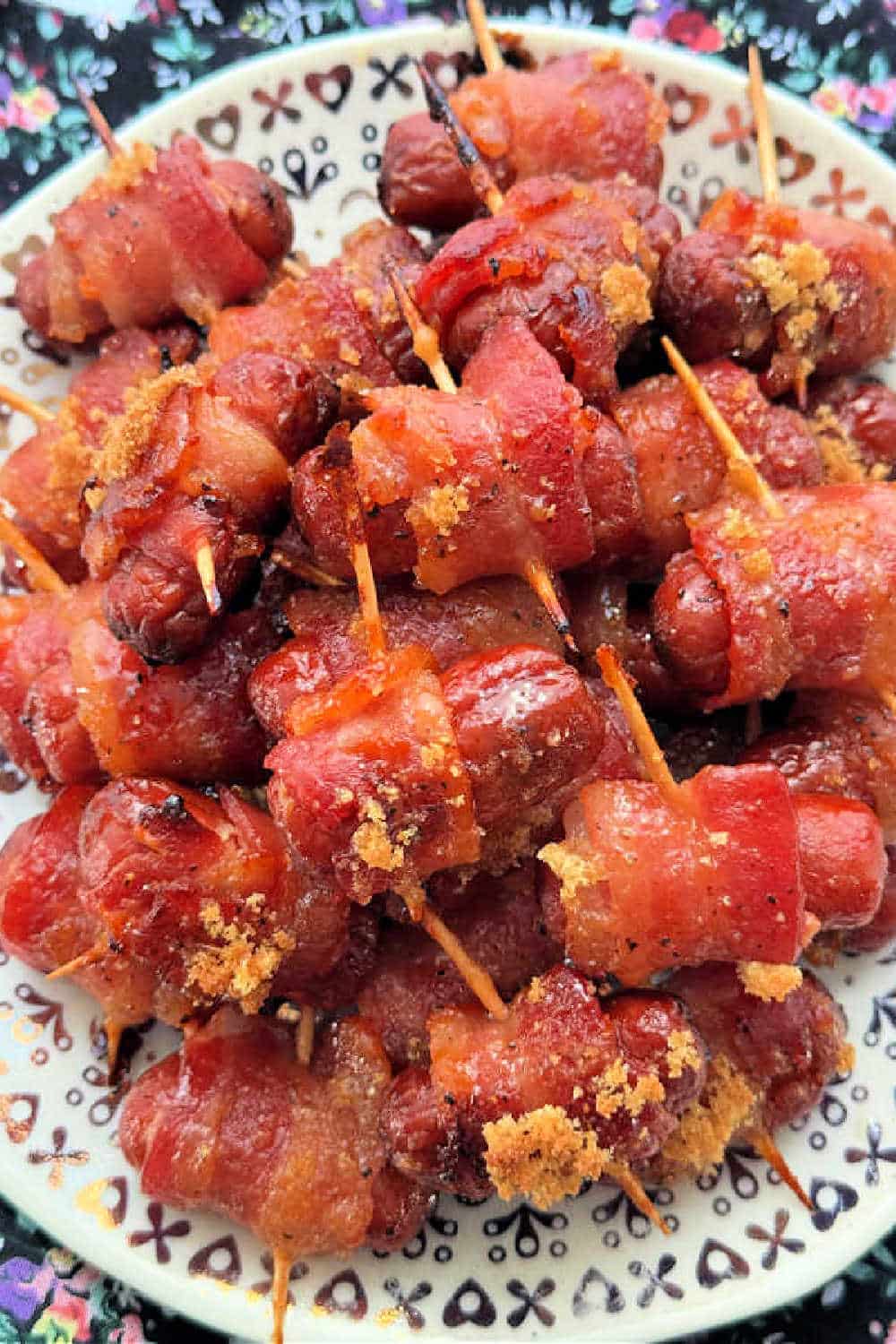 Bacon Wrapped Smokies or lil smokies are a classic appetizer made even better by basting with brown sugar, butter and bourbon. via @foodtasticmom