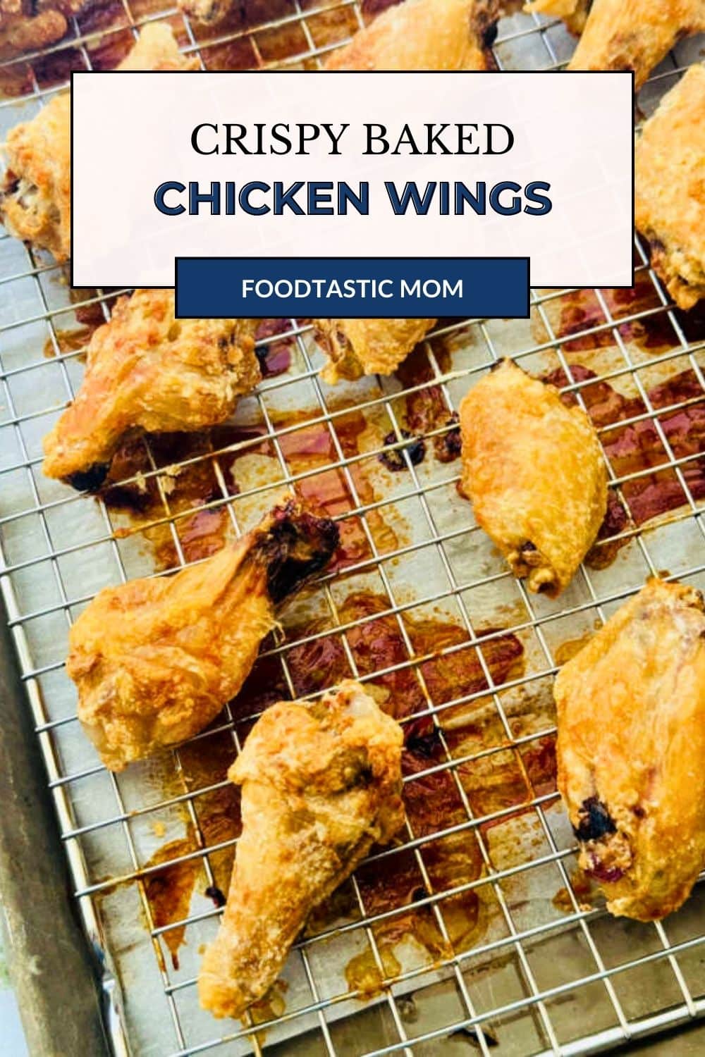 Ditch the deep fryer and make these oven-baked chicken wings that are incredibly crunchy on the outside and juicy on the inside. Using a simple baking powder trick, these wings achieve a perfect, golden, "oven-fried" texture. They are a healthier yet delicious appetizer or main dish for game day, parties, or a satisfying family dinner. via @foodtasticmom