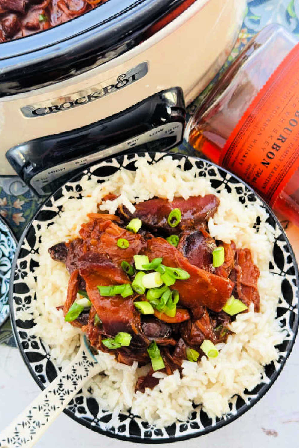 The yummy sauce for my Bourbon Chicken in the Crock Pot is perfectly sticky thanks to a few secret ingredients including a microwave roux. via @foodtasticmom