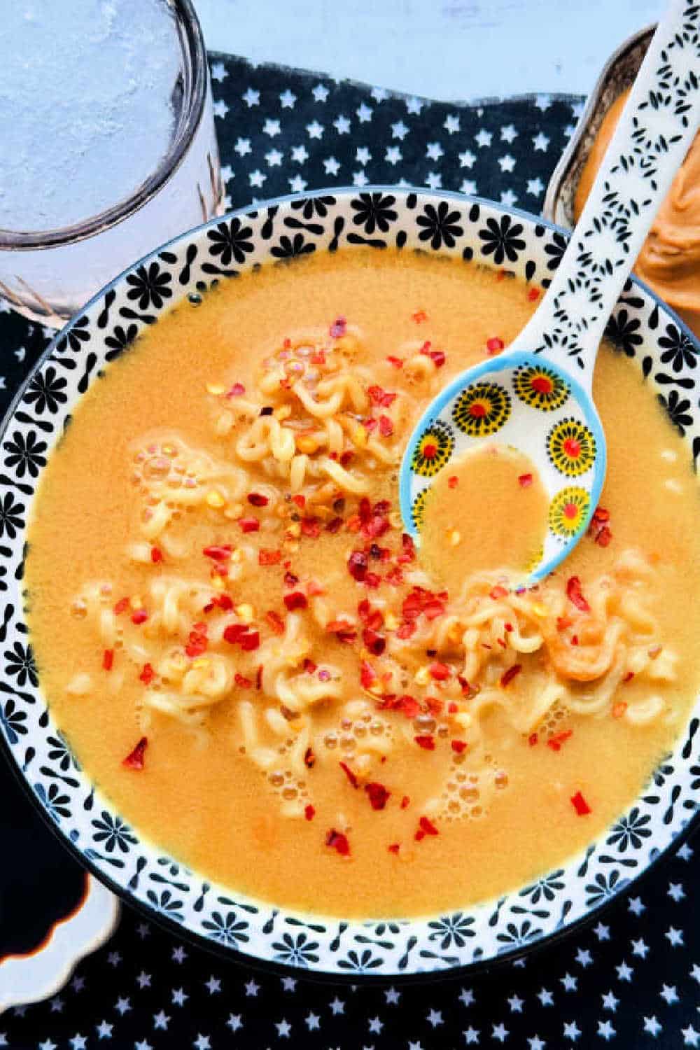 Turn economical instant ramen noodles into a delicious dish with a spicy peanut sauce made from a few simple ingredients. via @foodtasticmom