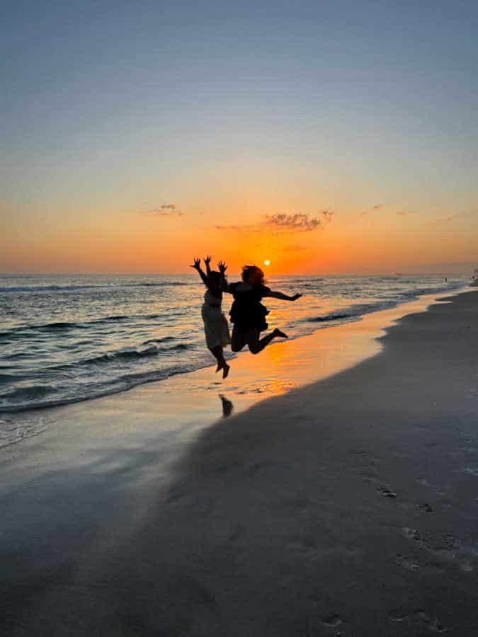 Hannah and her friend on the beach in Panama City Beach Florida