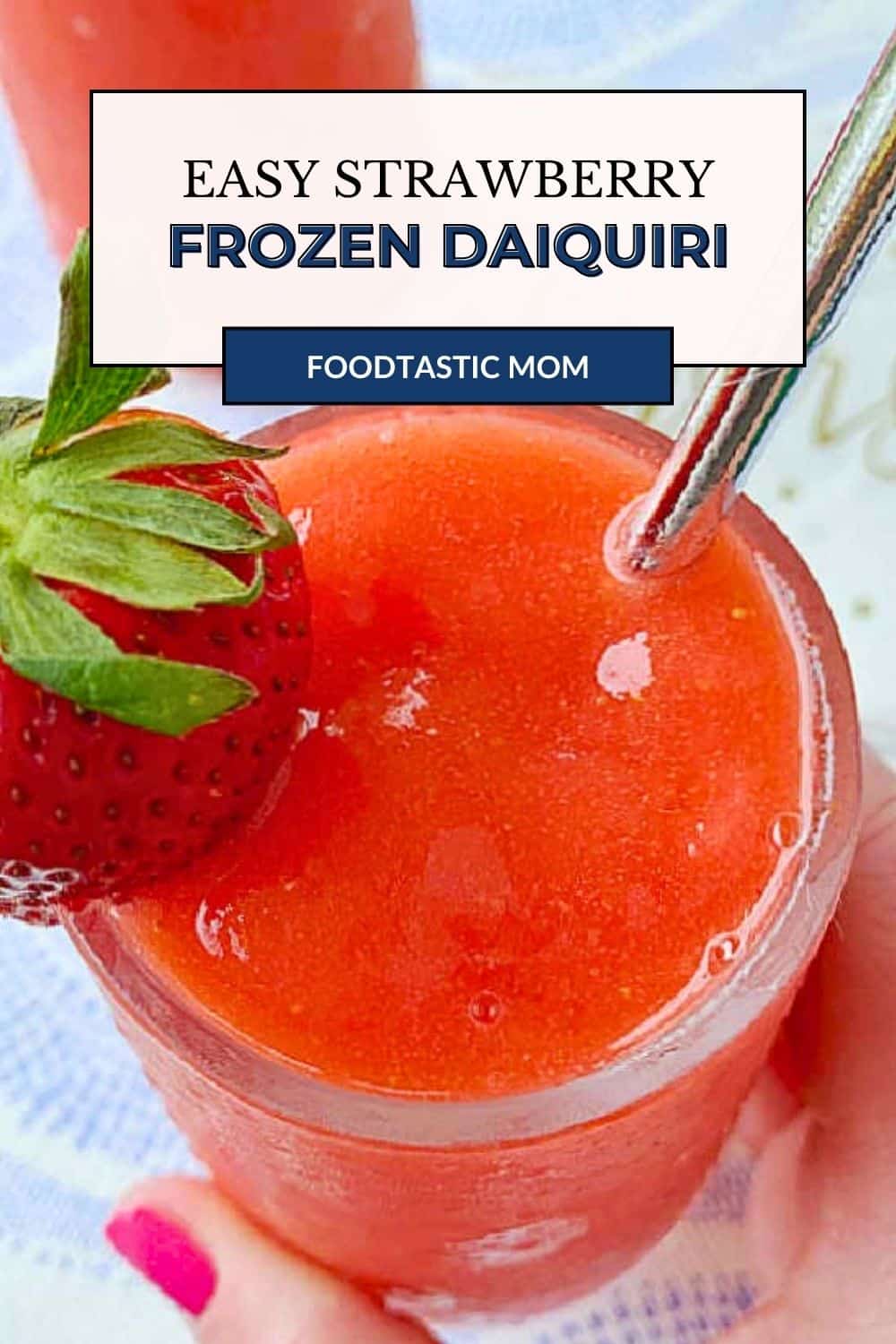 The best strawberry daiquiri is made with simple ingredients - frozen berries, the best rum, strawberry jam, powdered sugar and cardamom. via @foodtasticmom
