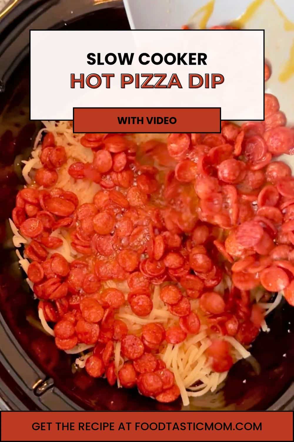This is an easy cheesy hot pizza dip recipe that is made for the slow cooker! A perfect appetizer that will be a huge hit at your next gathering. via @foodtasticmom