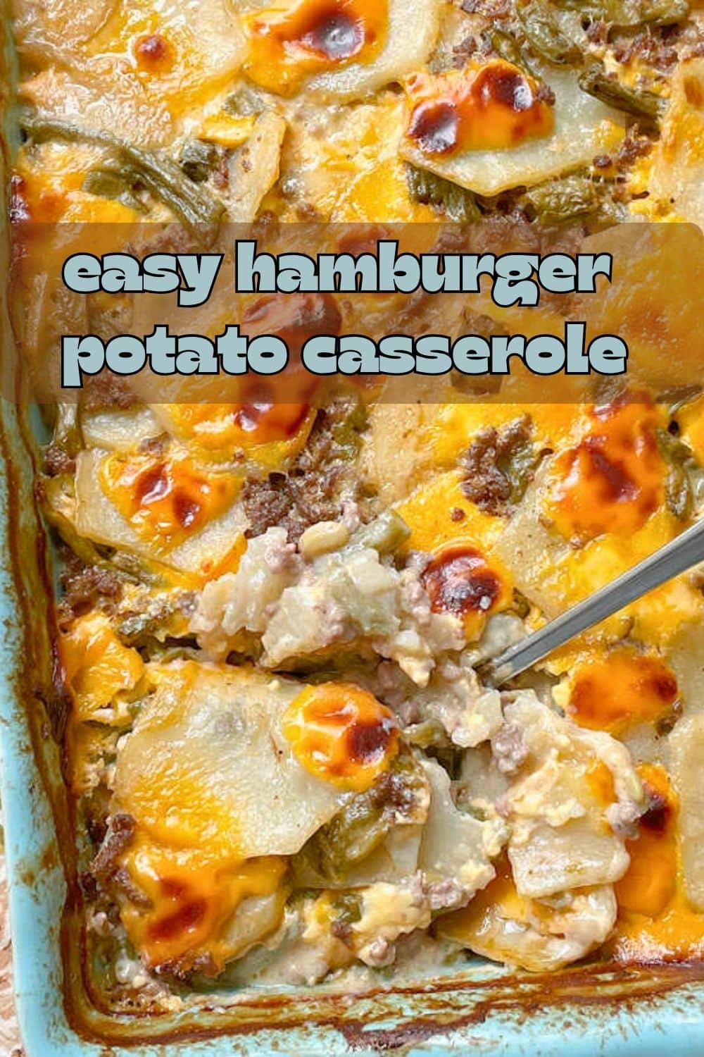Hamburger Potato Casserole combines potatoes with ground beef and green beans in a velvety cheese sauce. It is pure comfort food. via @foodtasticmom