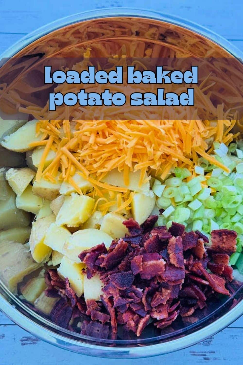Easy loaded baked potato salad recipe is the perfect side dish for your next BBQ. Its hearty flavor is just right to pair with grilled meats. via @foodtasticmom