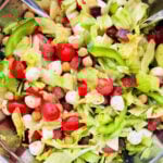 freshly tossed italian chopped salad in a mixing bowl