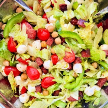 freshly tossed italian chopped salad in a mixing bowl