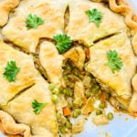 a dish of easy chicken pot pie with one slice removed