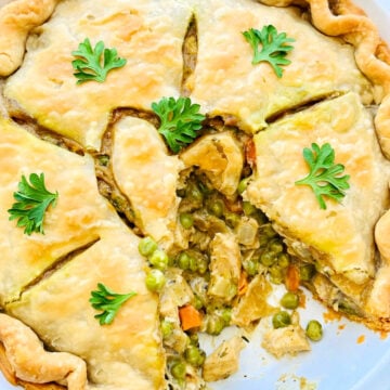 a dish of easy chicken pot pie with one slice removed