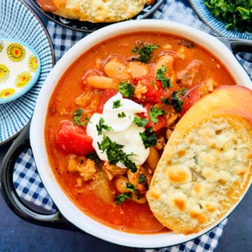 a crock full of buffalo chicken chili with blue cheese toast