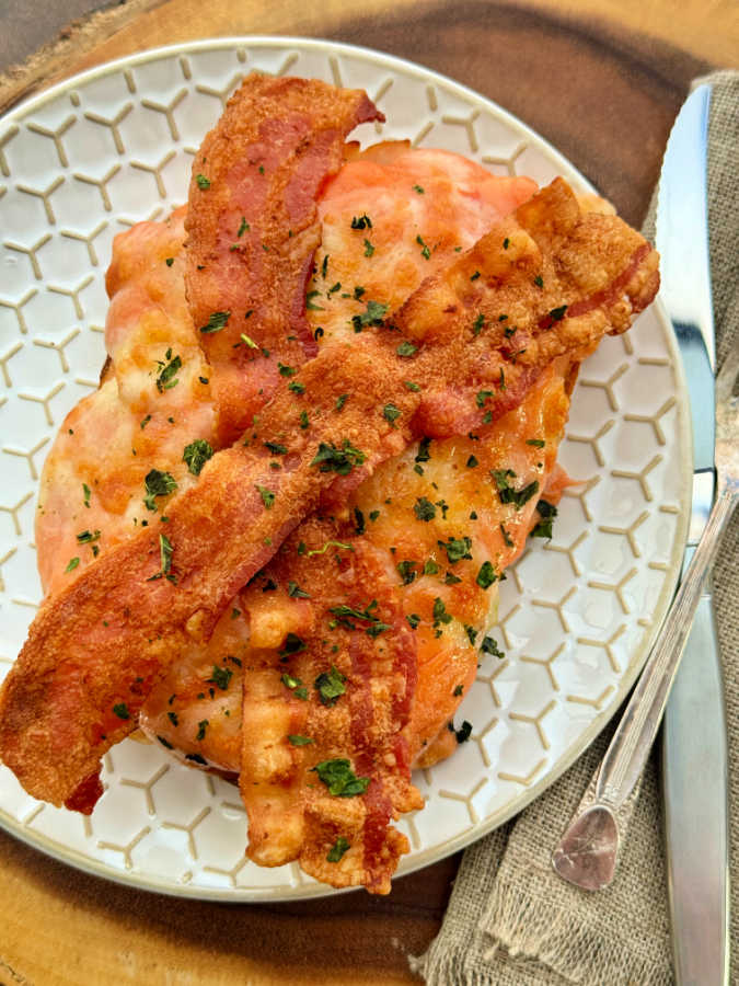 a freshly broiled and plated kentucky hot brown sandwich
