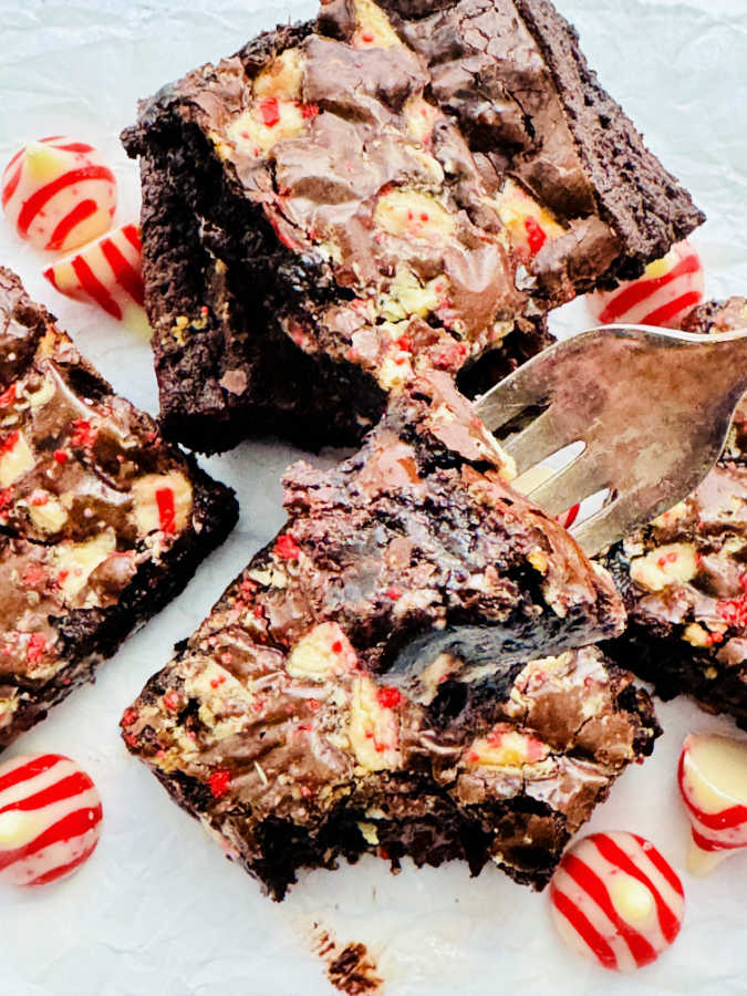 showing a closeup bite of brownie on a fork