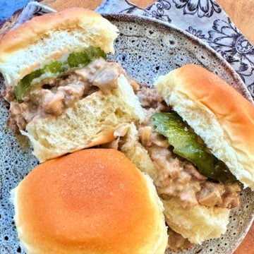 three white castle sliders plated and ready to eat