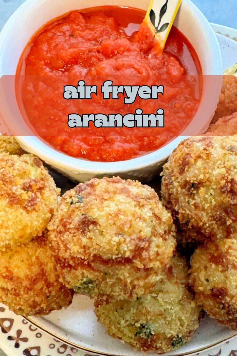 Quick and easy air fryer arancini balls are Italian style comfort food. They are a great way to use up leftover rice or cold risotto. via @foodtasticmom