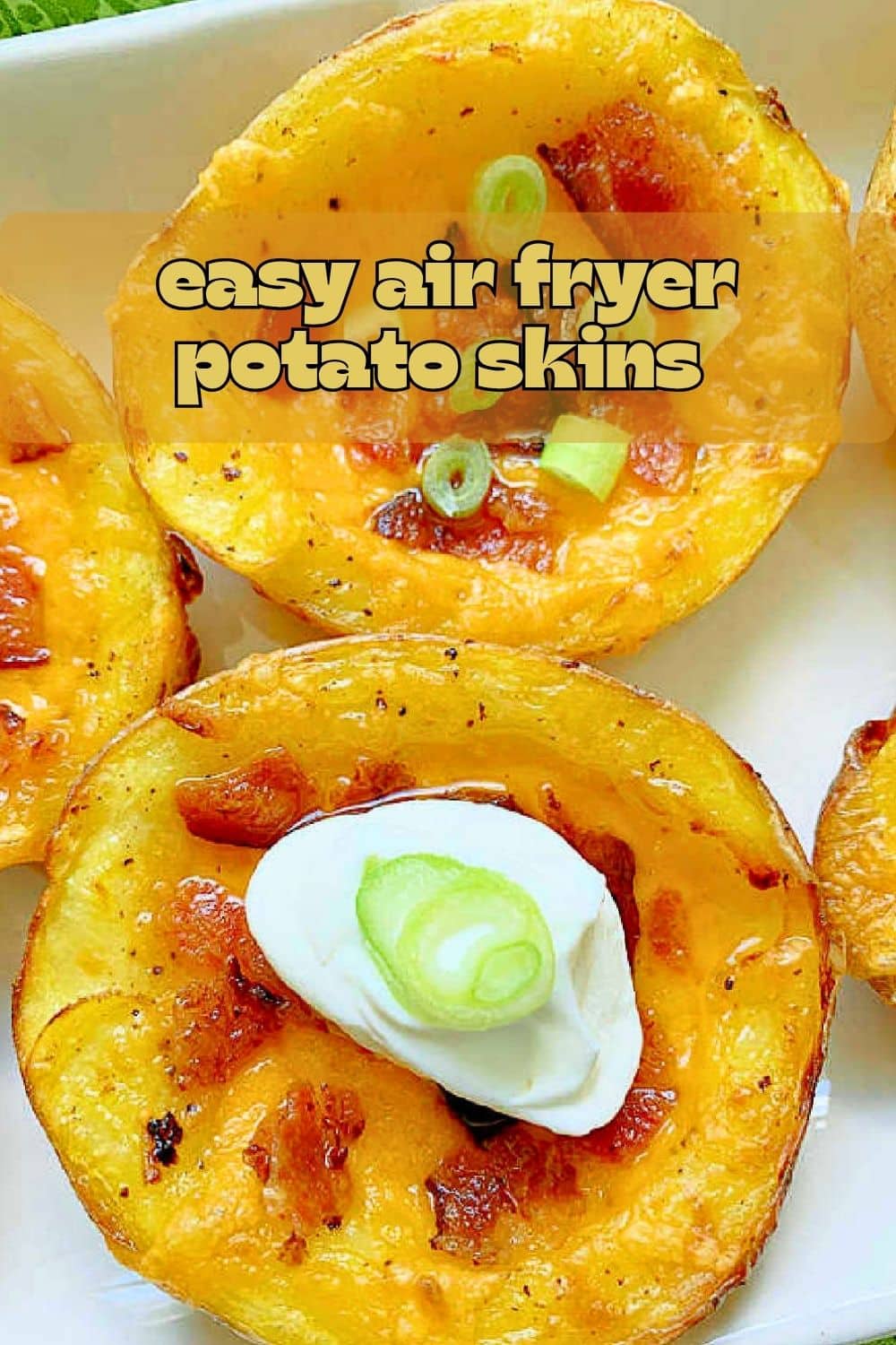 These Air Fryer Potato Skins are even better than restaurant skins. Start in the microwave, brush with bacon fat, then air fried. via @foodtasticmom