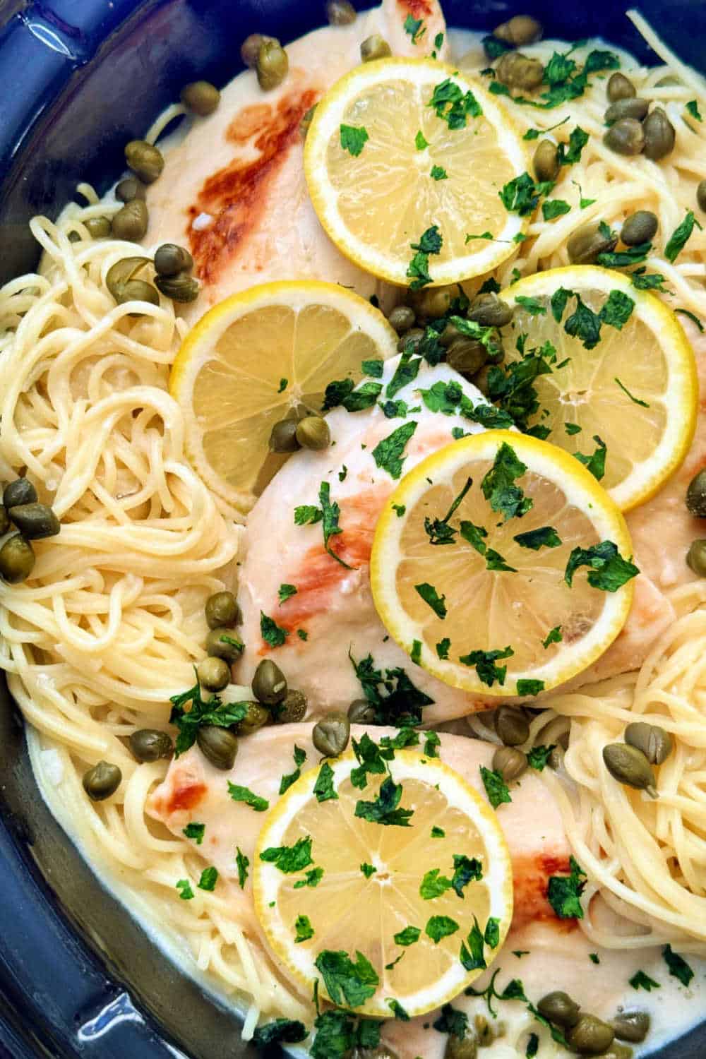 My crock pot chicken piccata recipe uses boneless skinless chicken breast with a butter and flour mixture for a delicious thicker sauce. via @foodtasticmom