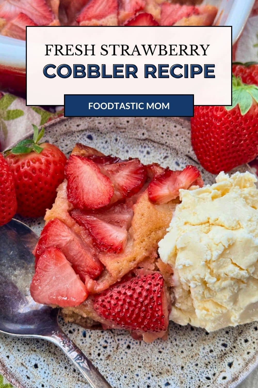 My easy strawberry cobbler recipe with brown sugar and cinnamon is such a cozy dessert, perfect topped with a big scoop of vanilla ice cream. via @foodtasticmom