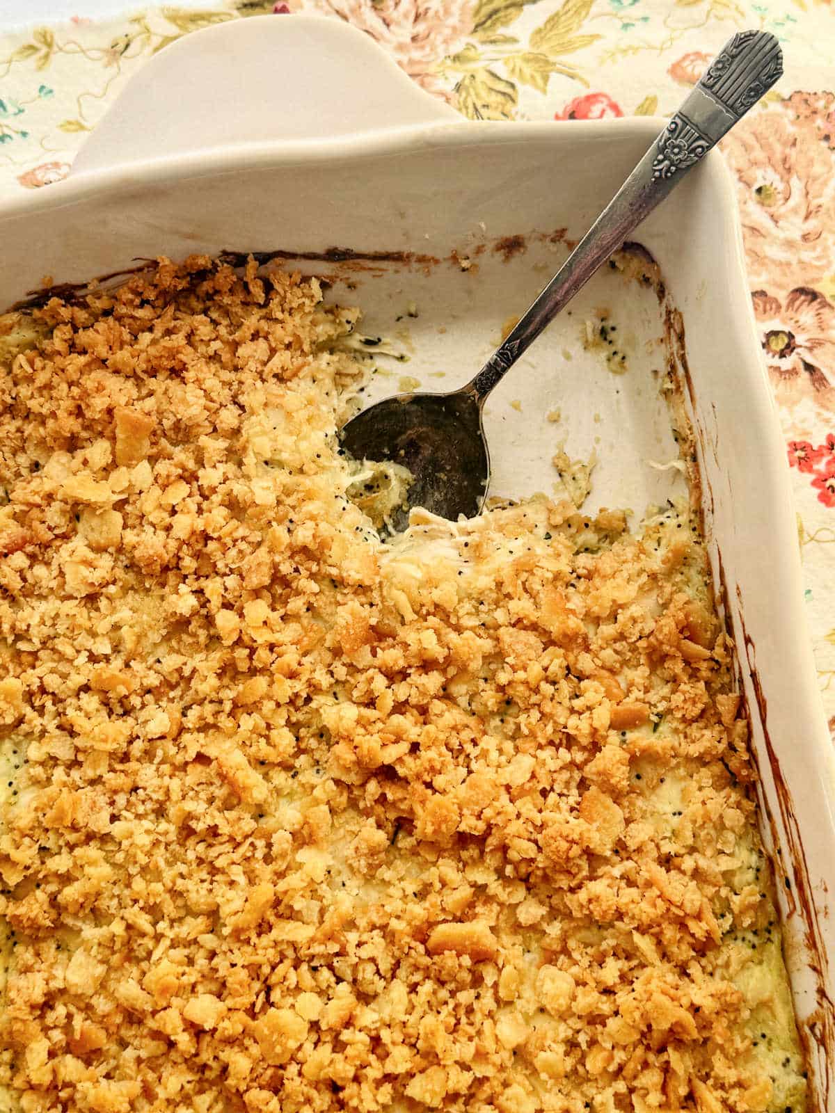 serving poppy seed chicken from the casserole dish