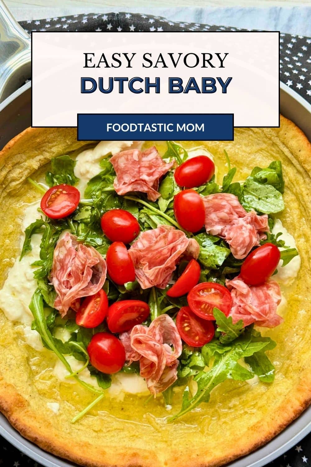 This delicious savory dutch baby pancake dressed with a simple salad can be ready to serve in just thirty minutes. via @foodtasticmom