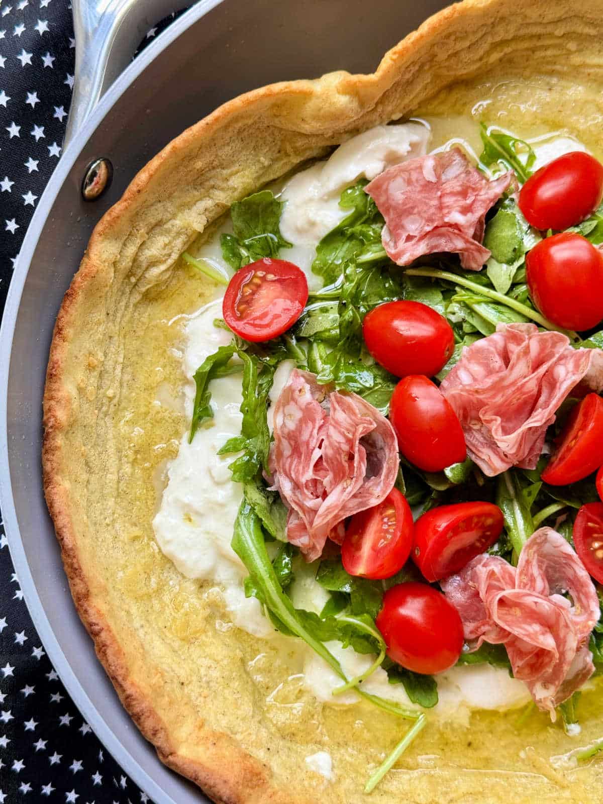 top view of savory dutch baby in skillet