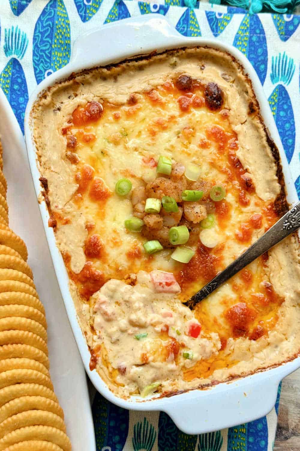 This cajun shrimp dip recipe is loaded with garlic buttery shrimp. Its creamy texture and bold flavor is a real crowd pleaser. via @foodtasticmom