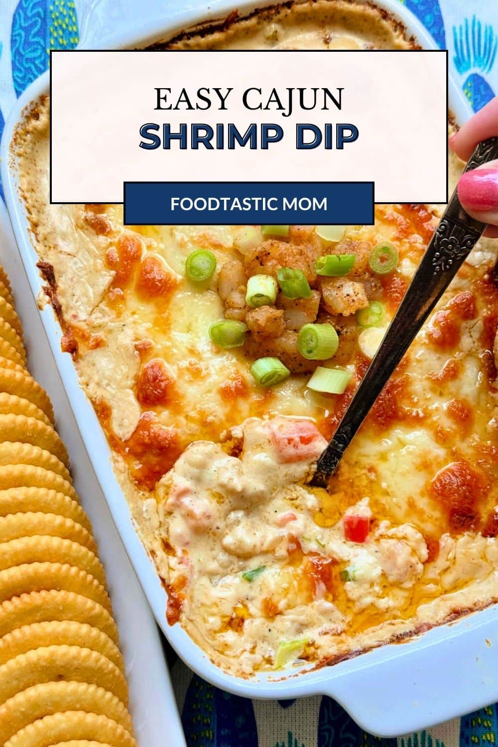 This cajun shrimp dip recipe is loaded with garlic buttery shrimp. Its creamy texture and bold flavor is a real crowd pleaser. via @foodtasticmom