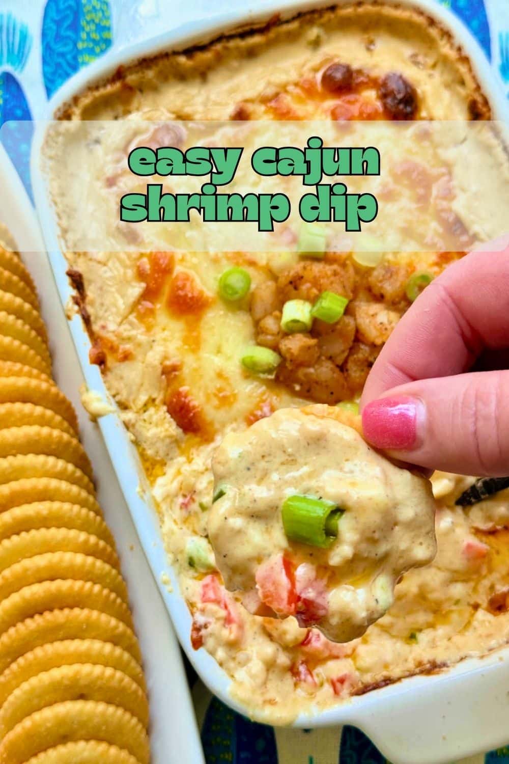 This cajun shrimp dip recipe is loaded with garlic buttery shrimp. Its creamy texture and bold flavor is a real crowd pleaser. via @foodtasticmom