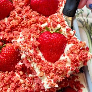 serving a slice of cake from the baking pan