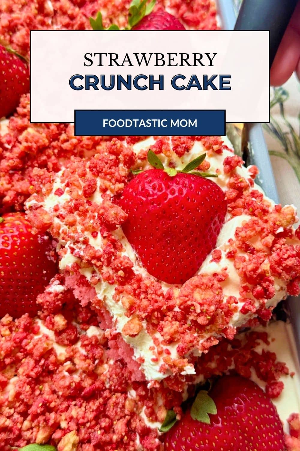 My strawberry crunch cake recipe is a pink hued sheet cake made with white cake mix and crunch topping like the ice cream bar. via @foodtasticmom