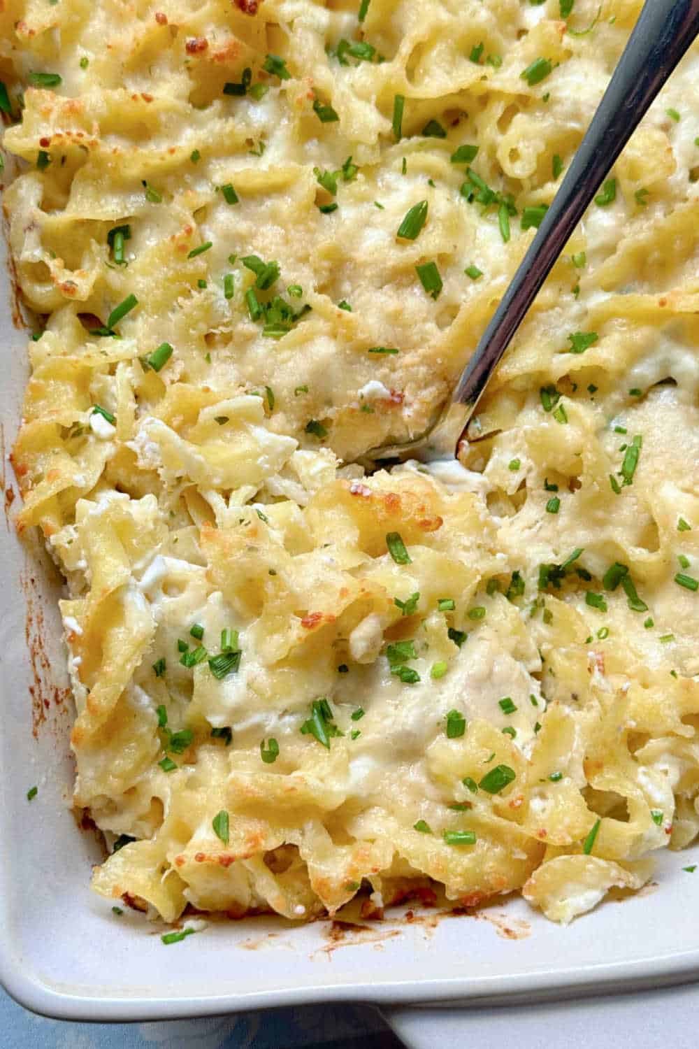 Chicken ranch casserole takes inspiration from Jackie O's favorite noodle dish. Cottage cheese and sour cream blend with chicken and ranch. via @foodtasticmom