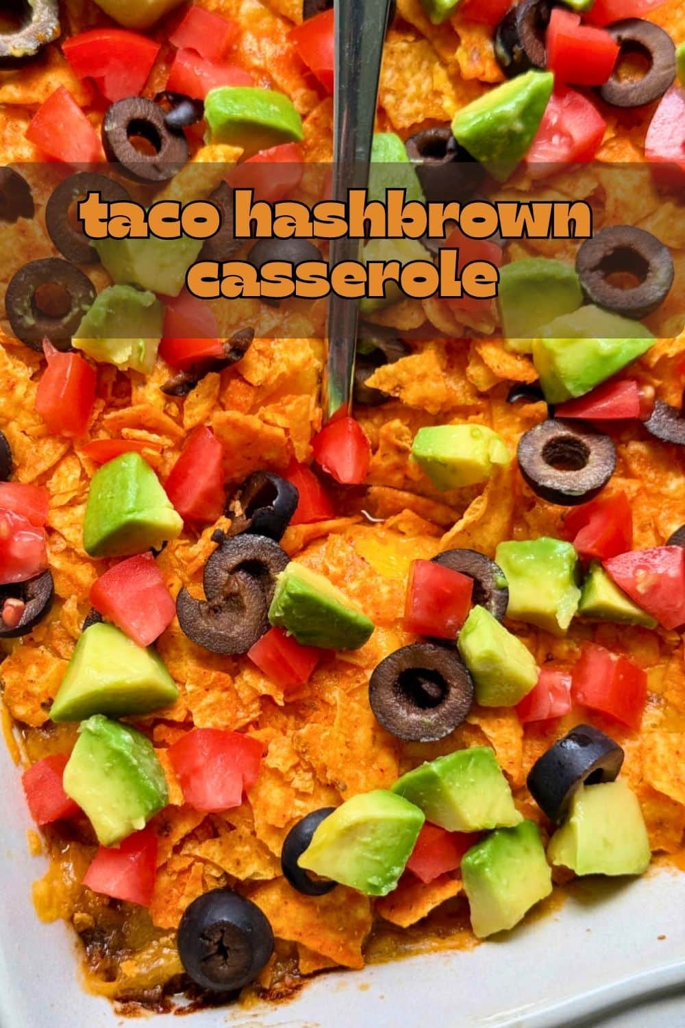 My taco hash brown casserole combines my cheesy potatoes with taco seasoned ground beef and taco toppings. It's comforting and kid friendly. via @foodtasticmom