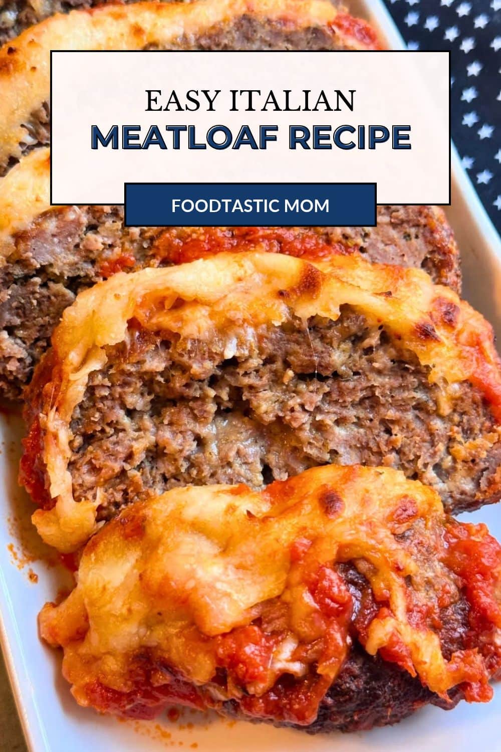 My Italian meatloaf recipe is made with ground pork, lean ground beef, three kinds of cheese and is smothered in marinara sauce. via @foodtasticmom