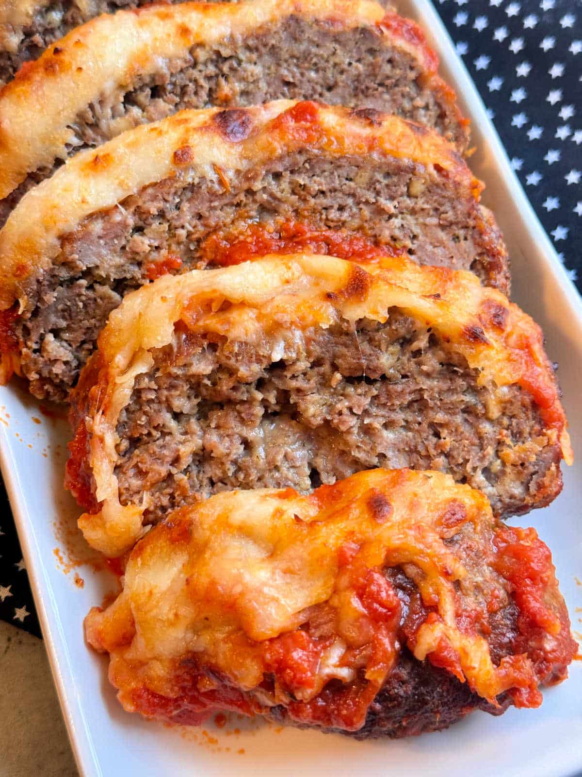 sliced Italian meatloaf plated and ready to serve