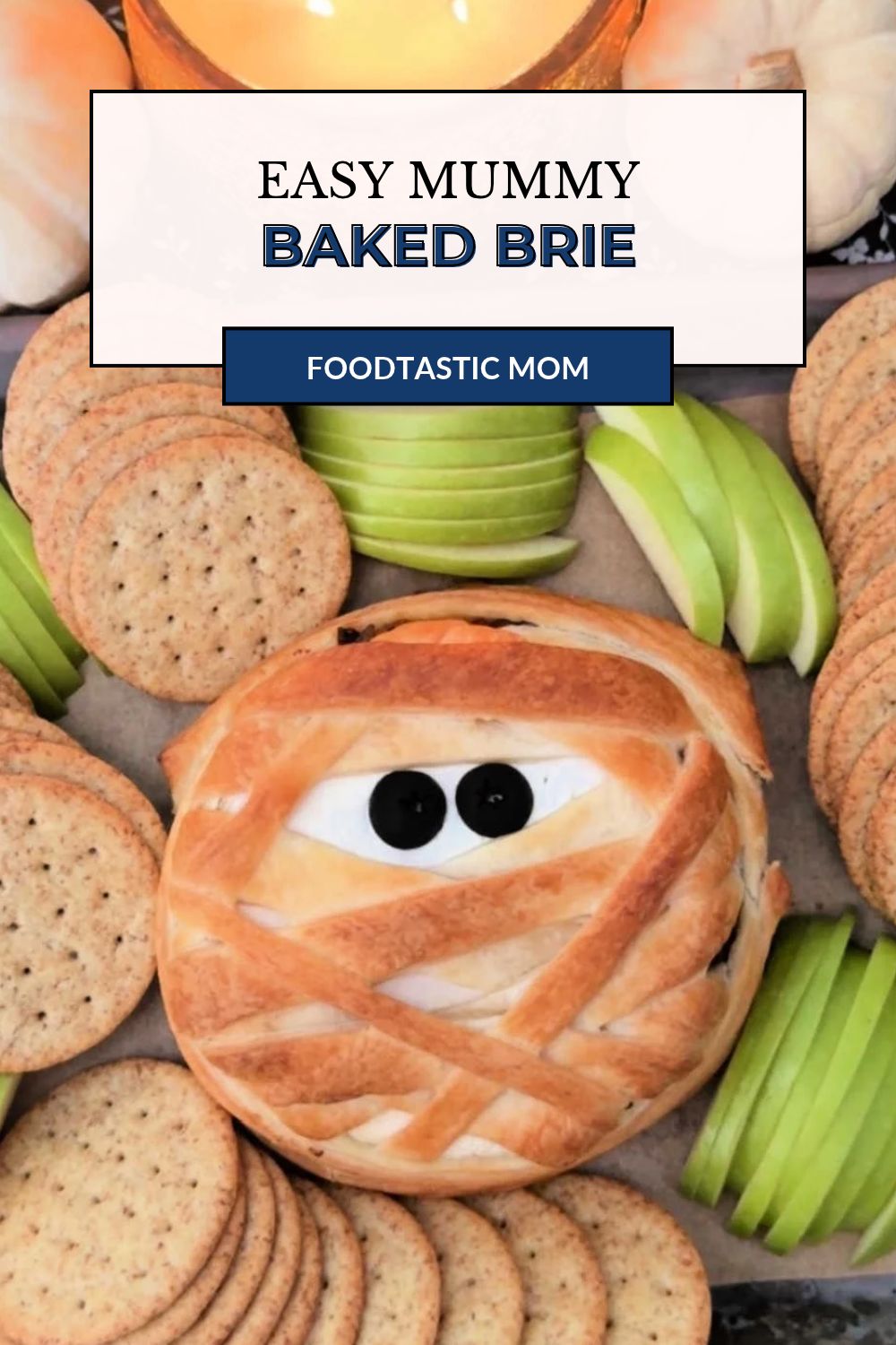 Mummy brie is a simple and spooky appetizer. Mushrooms and onions browned in butter stuffed inside brie wrapped in puff pastry strips. via @foodtasticmom