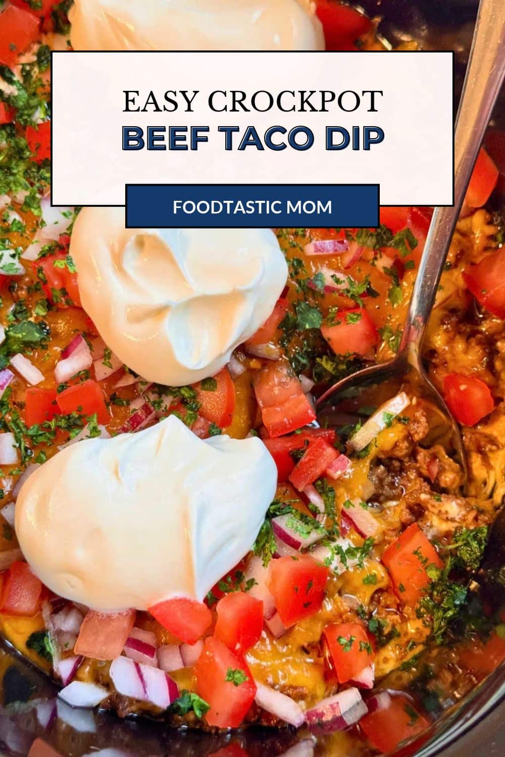 My viral pizza dip for the slow cooker inspired me to create this Crock-Pot Taco Dip. It's a tasty appetizer to feed a game day crowd. via @foodtasticmom
